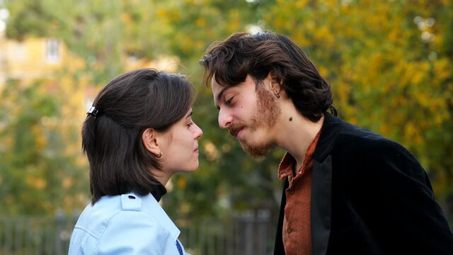 pushy friend -couple about to kiss are interrupted by an inappropriate friend