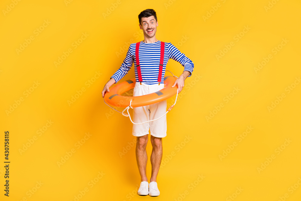 Sticker Full body photo of brown haired man wear safety circle red suspenders white shorts isolated on yellow color background