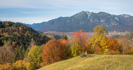 stunning autumn landscape bavarian alps, colorful edge of the woods, Garmisch area in october. hiking from Wamberg to Eckbauer Alm