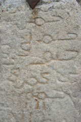 Writing on stone in the Alcazaba de Trujillo or Castillo de Trujillo is a fortress built between the 9th and 12th centuries in the town of Trujillo in Cáceres. Extremadura, Spain.