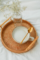 Breakfast in bed, cappuccino, wicker tray, spring, home decor. Cozy.