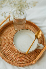 Breakfast in bed, cappuccino, wicker tray, spring, home decor. Cozy.