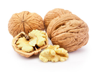 Kernel and whole walnut isolated on white background