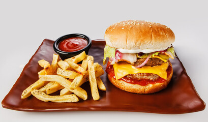 Burger. Juicy pork cutlet, cheddar cheese, crispy pickled onions, lettuce wrapped in a bun under two sauces. Served with french fries