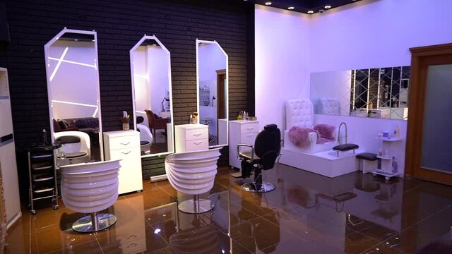 Horizontal Shot Of Empty Chairs In salon. Hair Salon Interior