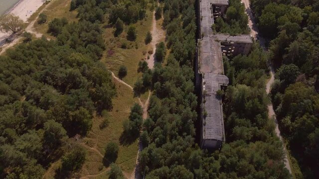 Flyover of destroyed and lost ruins of KDF Prora on island of R&uuml;gen, Baltic Sea. They were abandoned 30 years ago and built around World War 2.