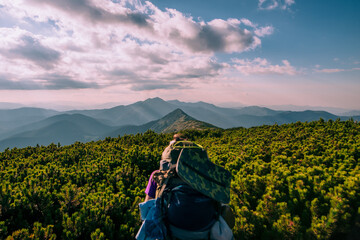 Tourist Girl on the Mountain Trail Hike Backpacking 