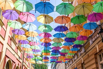 Fototapeta na wymiar umbrellas against a sunny sky. summer background
