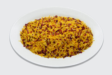 Delicious Fruits biryani served in white ceramic plate, Steamed yellow rice with dry red fruits, Beautiful Fruits biryani photography with white background
