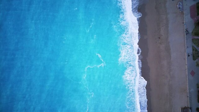 Amazing high angle top drone view on world famous paragliding and parasailing turkish spot for extrim parachute sport in Oludeniz in Fethiye, Turkey
