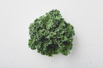 Kale fresh salad veggie superfood on marble table