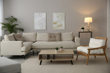 Big comfortable sofa in living room. Interior design