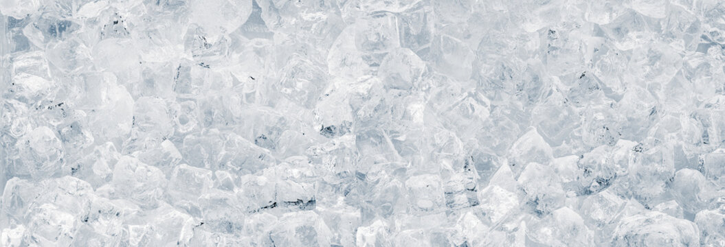 Ice cubes background pattern. Wide-angle crushed ice cubes. Freshness concept.
