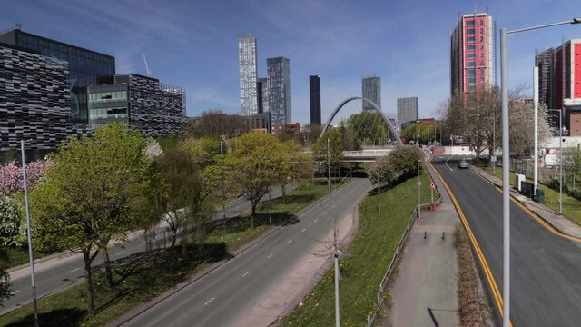 4K: Timelapse Hulme Bridge in Manchester, England, UK. Traffic on road into the City with Skyscrapers behind. Stock Video Clip Footage