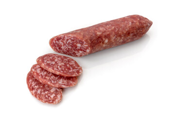 Italian salami, whole sausage cut with slices,  isolated on white, copy space