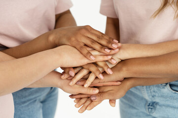 Different ethnicity female hands. Multicultural diversity and friendship.