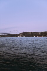 Obraz premium Cable-stayed bridge over Bosphorus at sunset (Istanbul, Turkey)