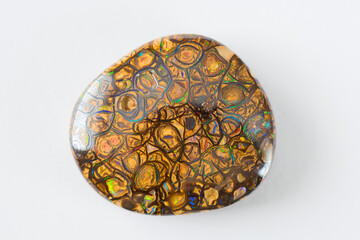 Australian natural light brown matrix boulder multi color play neon blue, green and red veins opal...