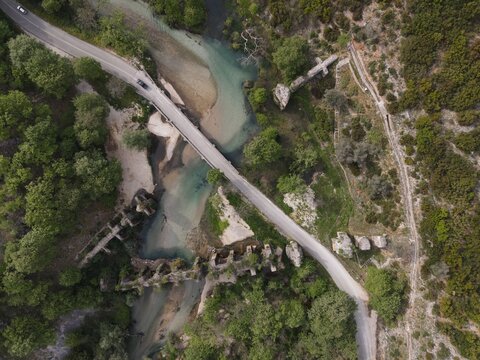 aerial view of ancient roman aqueduct ruins of nikopolis in river louros in saint george village near preveza, arta, epirus, greece.