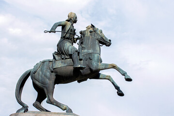 Fototapeta premium the equestrian statue of George Karaiskakis in Athens, Greece. cloudy day