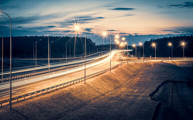 Obraz na płótnie Canvas lights of moving cars at night. long exposure