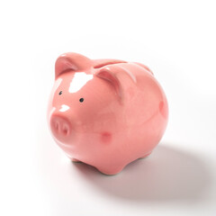 Pink piggy bank on white background. Saving.