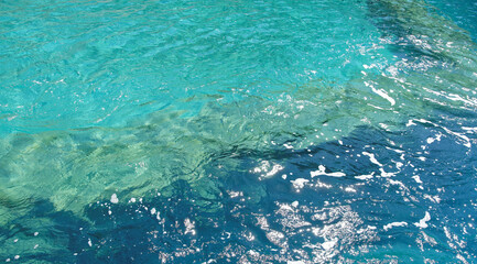 Fototapeta premium Kekova is an island that under the water preserves the ruins of 4 ancient cities.Under the water are visible port facilities