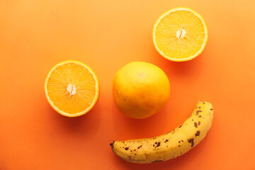 close up of slice of orange fruit on color background 