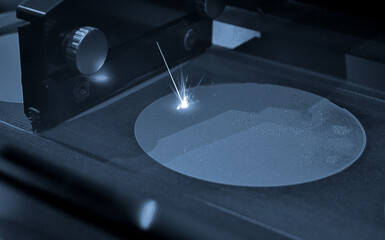 The process of creating a metal object with a laser.