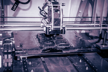 Modern 3D printer printing figure close-up. Automatic three dimensional