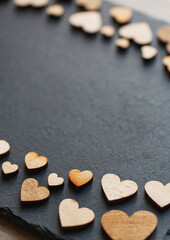 Wooden hearts in retro style as concept of love