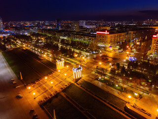 Fototapeta na wymiar Volgograd embankment, promenade in the Park at night, aerial view from drone