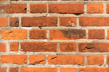 brick red wall. background of a old brick house.