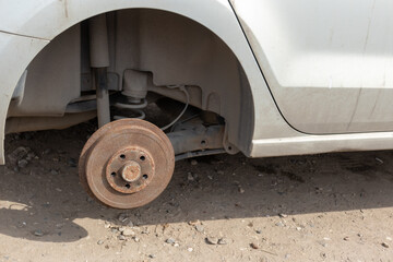 the drum brake of the car in close-up. rusty round part