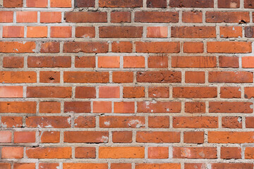 brick red wall. background of a old brick house.