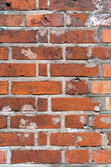 Fototapeta premium brick red wall. background of a old brick house.