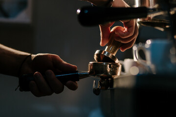 barista prepares coffee