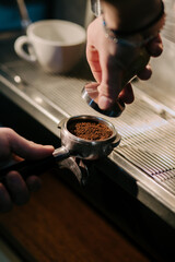 barista prepares coffee