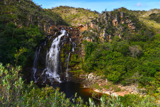 The idyllic Cachoeira da Serra Morena waterfall on the rocky landscape of Serra do Cip&oacute; range, Minas Gerais, Brazil