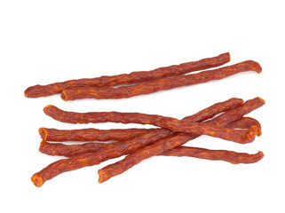 Smoked spicy sausages on a white background