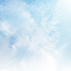 Obraz premium Blue sky with white cloud. Blue background. The summer sky is colorful clearing day and beautiful nature in the morning. for backdrop decorative and wallpaper design. The perfect sky background.