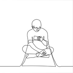 man procrastinates with a phone while sitting on a fitness mat - one line vector drawing. The guy is sitting in Turkish stuck in the phone, he is lazy to train