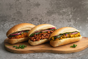 Indian Surinamese sandwiches filled with roti chicken curry,  cod fish or tandoori chicken 