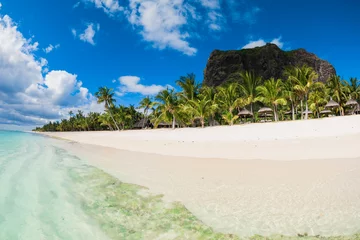 Papier Peint photo Le Morne, Maurice View of tropical island. Ocean with white sand beach, palms and sky in Mauritius