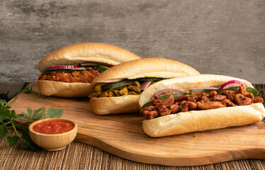 Indian Surinamese sandwiches filled with roti chicken curry,  cod fish or tandoori chicken 