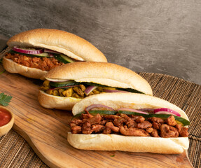 Indian Surinamese sandwiches filled with roti chicken curry,  cod fish or tandoori chicken 
