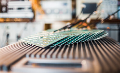 Close-up side view of a panel of SMD resistors