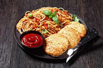 cod fish patties with pasta, top view