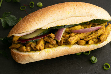 Indian Surinamese sandwiches filled with roti chicken curry,  cod fish or tandoori chicken 