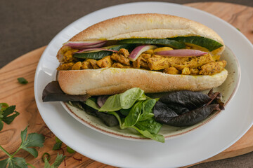 Indian Surinamese sandwiches filled with roti chicken curry,  cod fish or tandoori chicken 